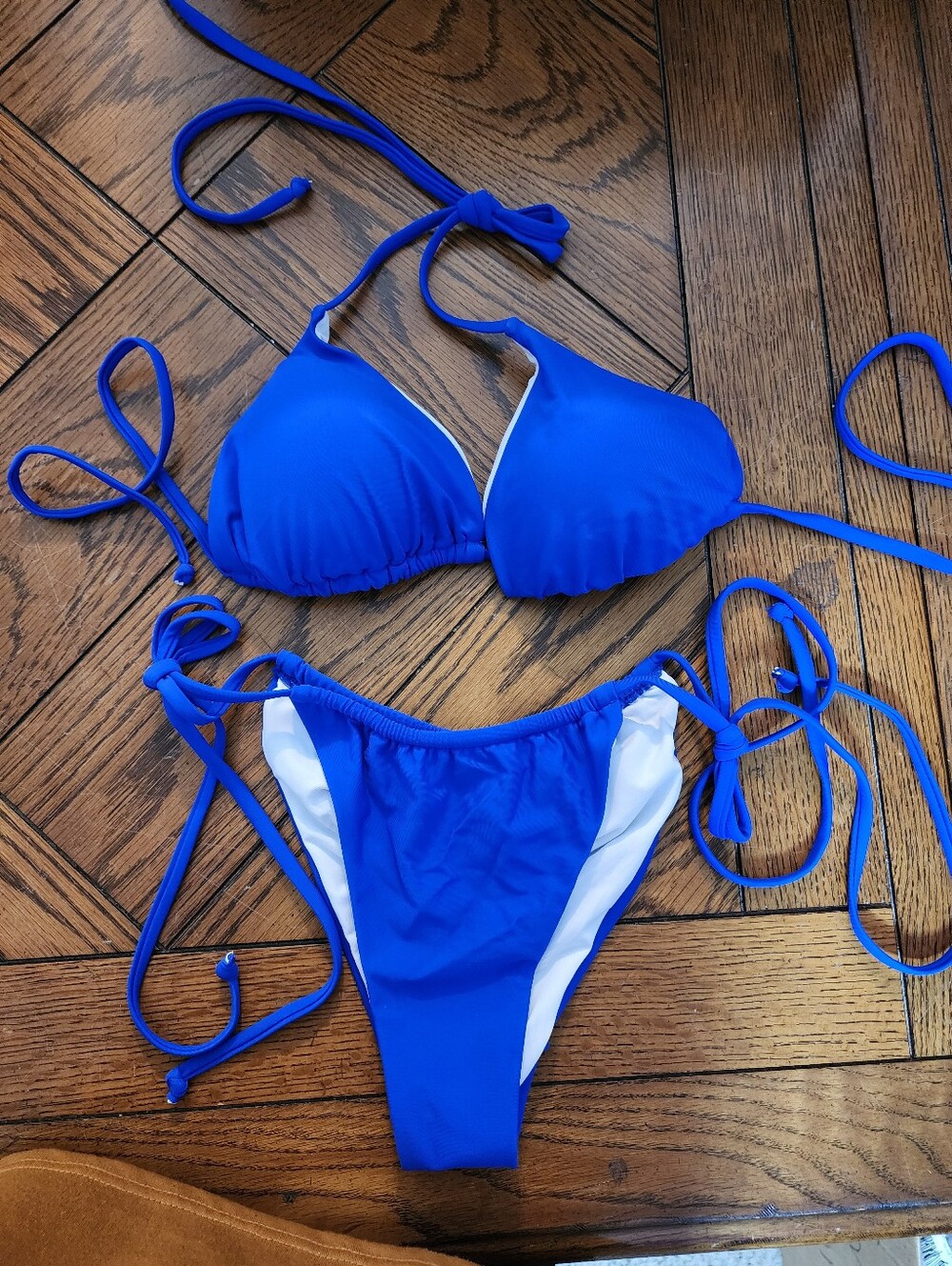 A4: Bright blue string bikini, removable pads